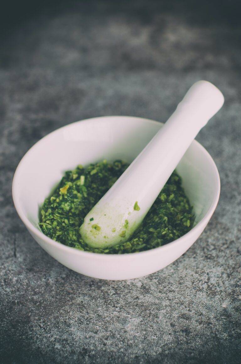 Freshly made pesto prepared in a traditional mortar and pestle