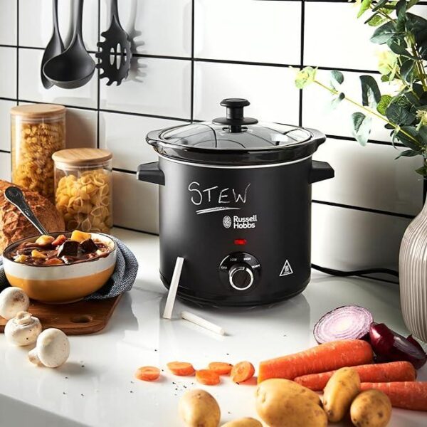 Display of the slow cooker, fruits and meat products that can be cooked together