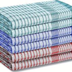 A set of 6 stacked multi colored cotton tea towels.