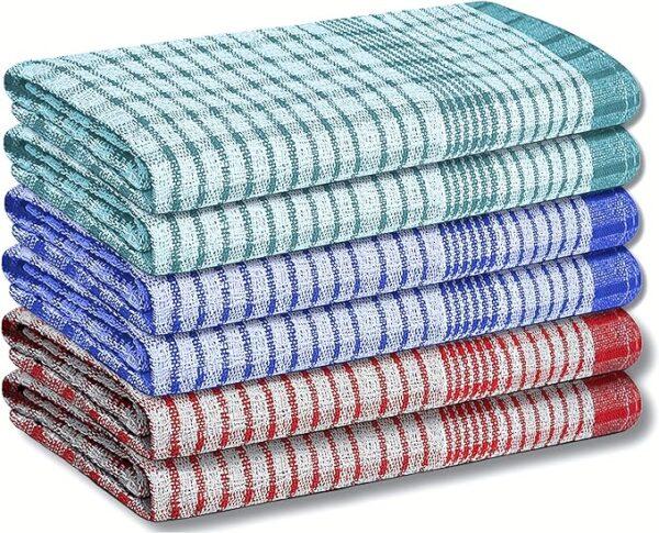 A set of 6 stacked multi colored cotton tea towels.