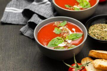 A bowl of tomato and basil soup